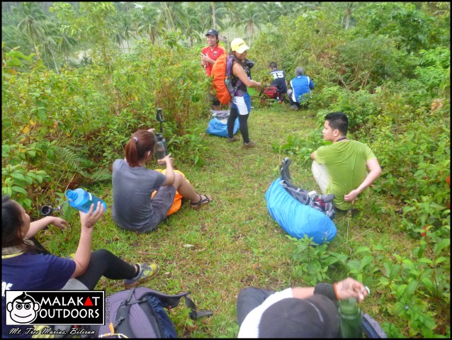 Our first rest of the climb after our ordeal through the muddy section.