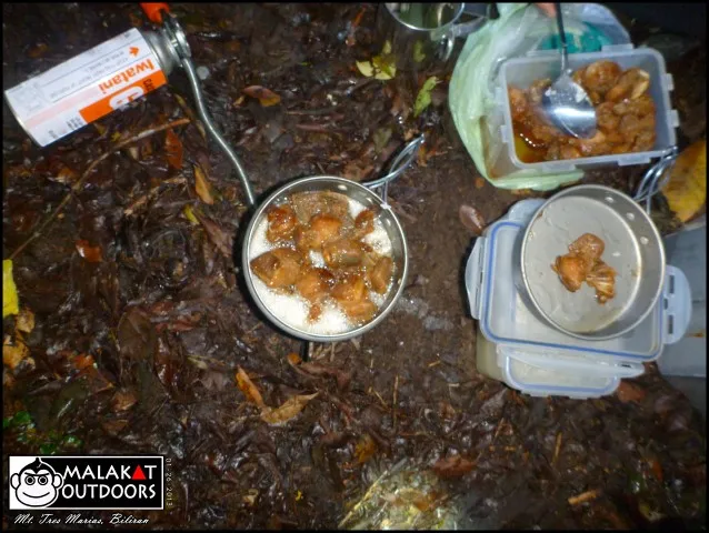 Adobo (cooked Rain style). Not in the picture, the half cooked rice, dried fish & chicken soup Trek like a mountaineer, eat like a King.
